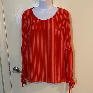 Red flowy blouse